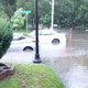 The view of that flood from my front porch. That white car was a brand new 7 Series, still wearing temporary tags.